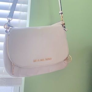 Michael Kors vanilla convertible flap shoulder leather handbag.